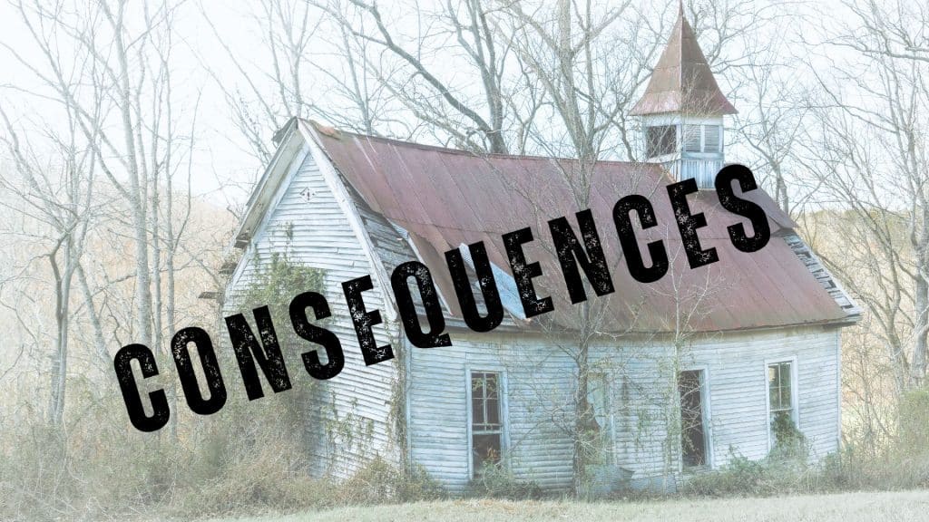 small, old, deteriorating church building in back woods