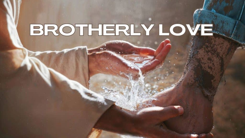 Jesus white robbed arms with His hands washing a man's muddy feet-