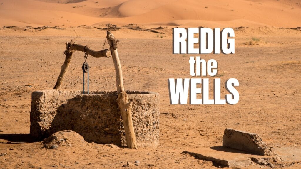 older broken down stone well in desert