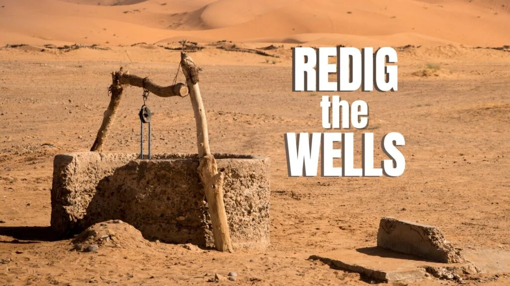 older broken down stone well in desert